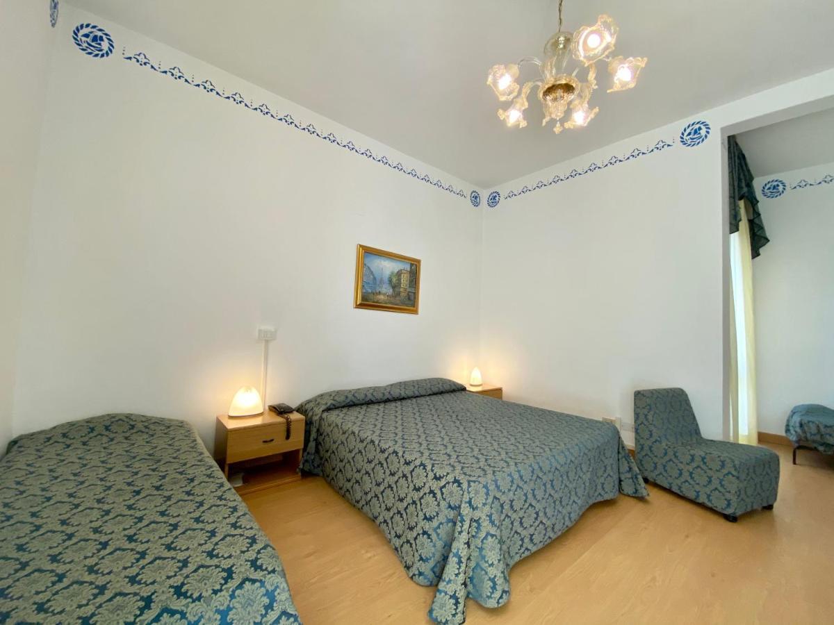 Quadruple Room with Side Sea View