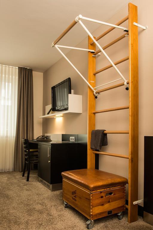 Habitación Individual con una pequeña zona de gimnasio