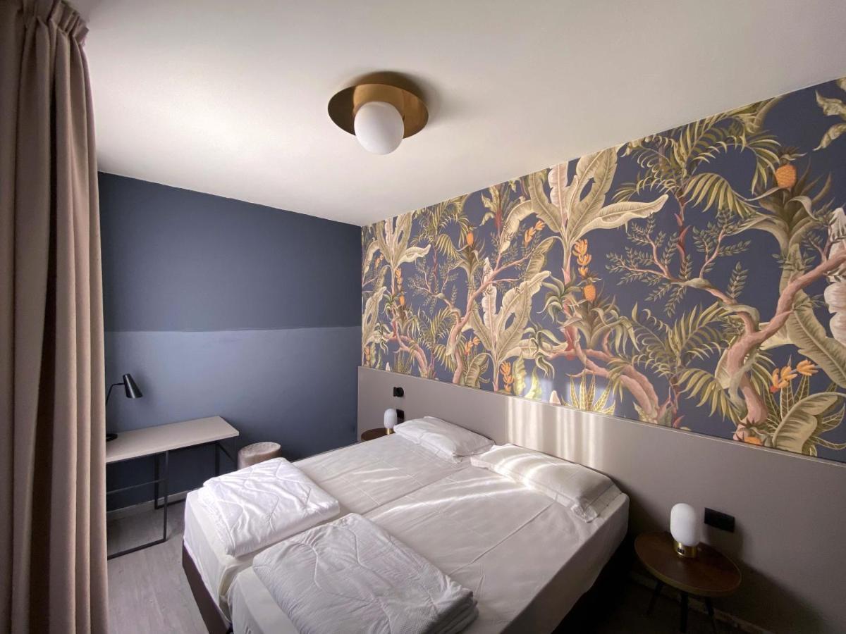 Doppel- oder Zweibettzimmer