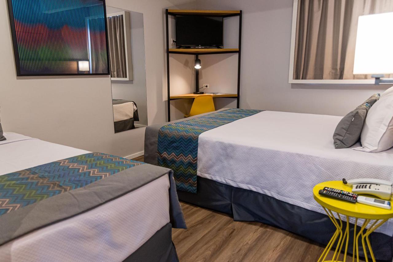 Quarto Triplo Standard com 1 Cama de Casal e 1 de Solteiro