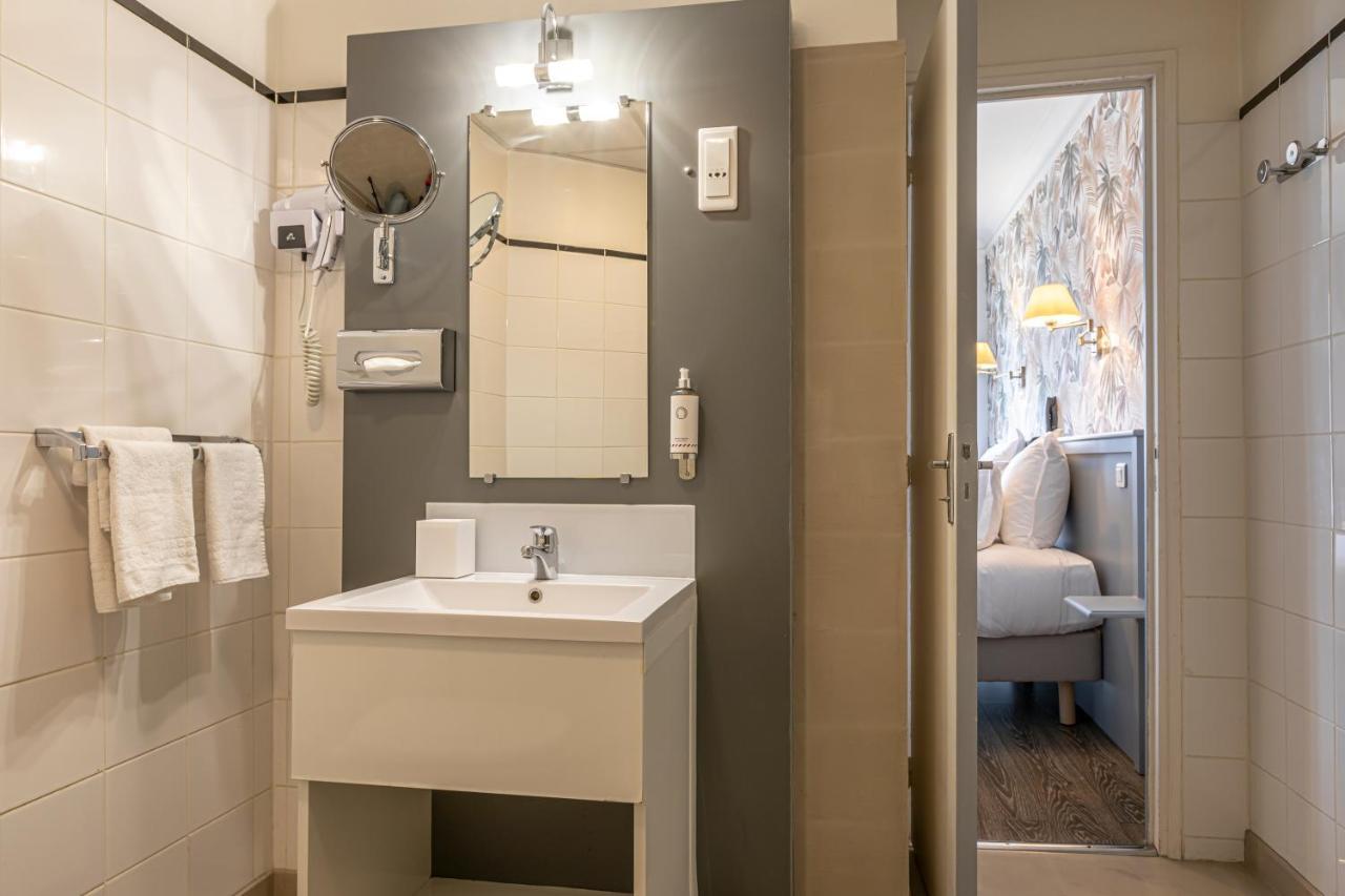 Quarto Triplo com Vista Torre Eiffel.