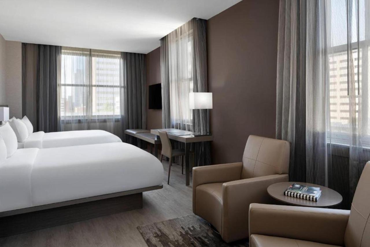 Larger Queen Room with Two Queen Beds and City View
