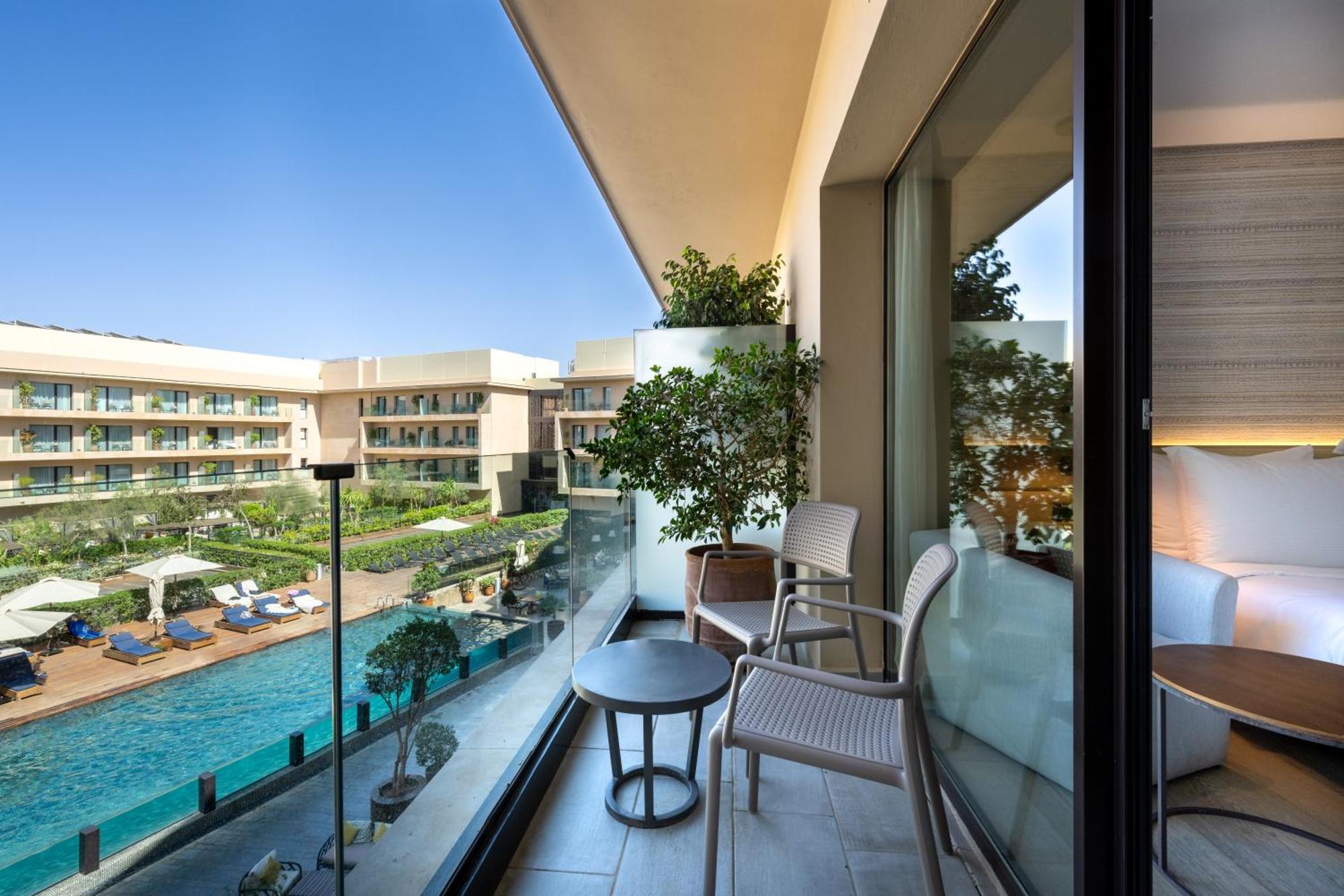 Superior Room Pool view Balcony,1551144550:JPEG