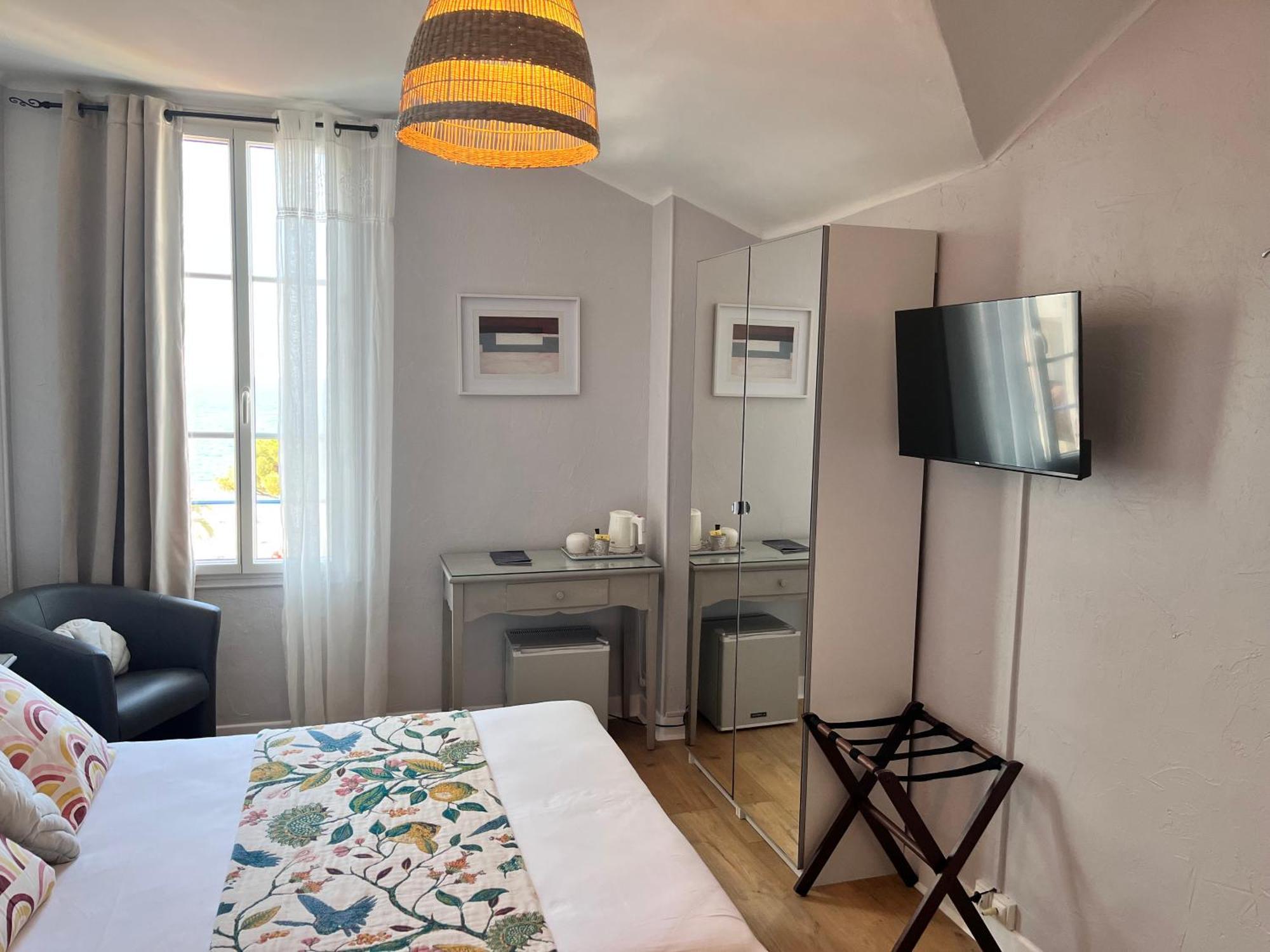 Mansard Roofed Double Room 4th Floor without lift Seaview,1660294650:JPEG