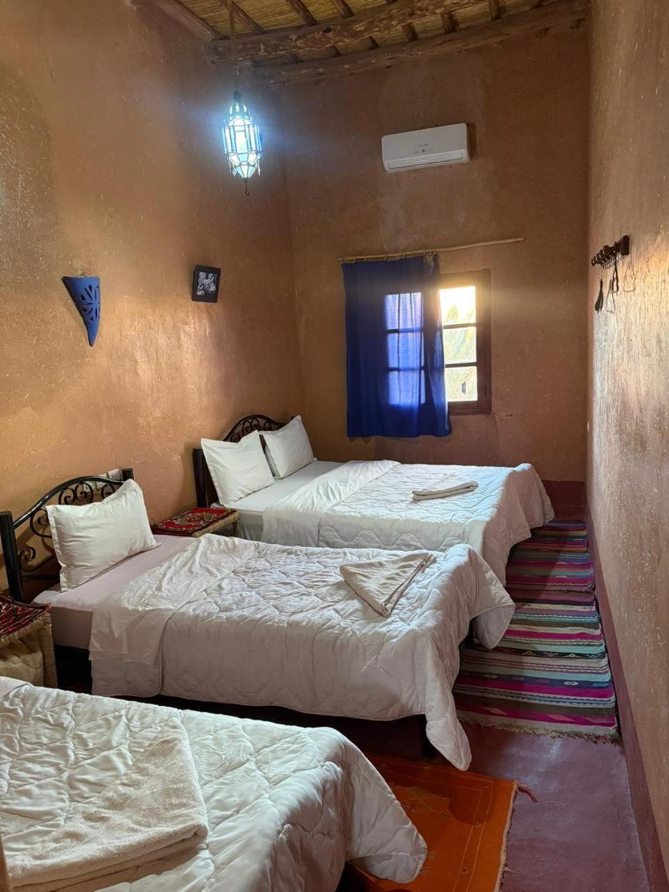 Chambre Quadruple avec Salle de Bains Privative