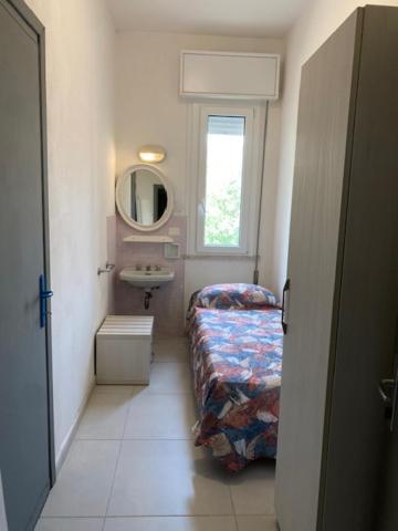 Camera Familiare con Bagno in Comune