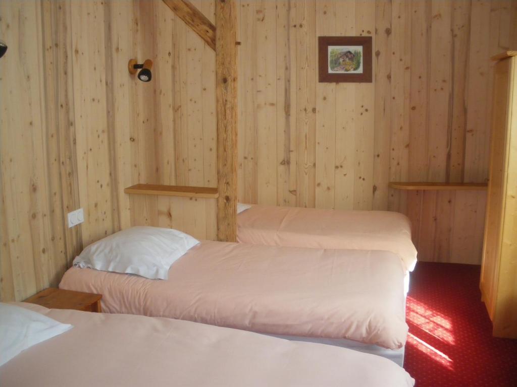 Driepersoonskamer met Eenpersoonsbedden